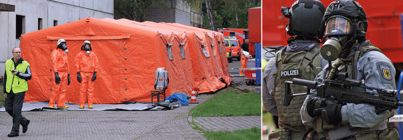 Bewaffnete Spezialkräfte der Polizei während der Übung „Wunderbaum“ zur Bewältigung eines bioterroristischen Anschlags in der Trainingsstadt „Fighting City“.  